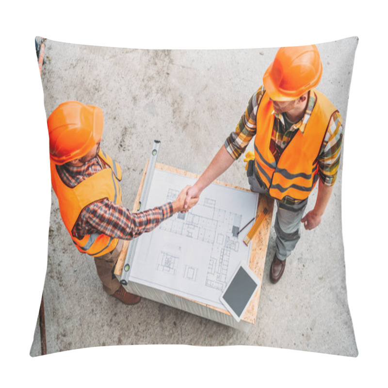 Personality  High Angle View Of Builders Shaking Hands Over Blueprint At Construction Site Pillow Covers