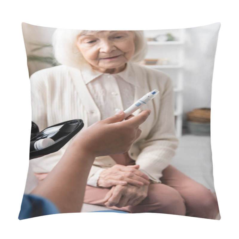 Personality  Multiracial Caregiver Holding Lancet Pen Near Senior Woman With Grey Hair  Pillow Covers