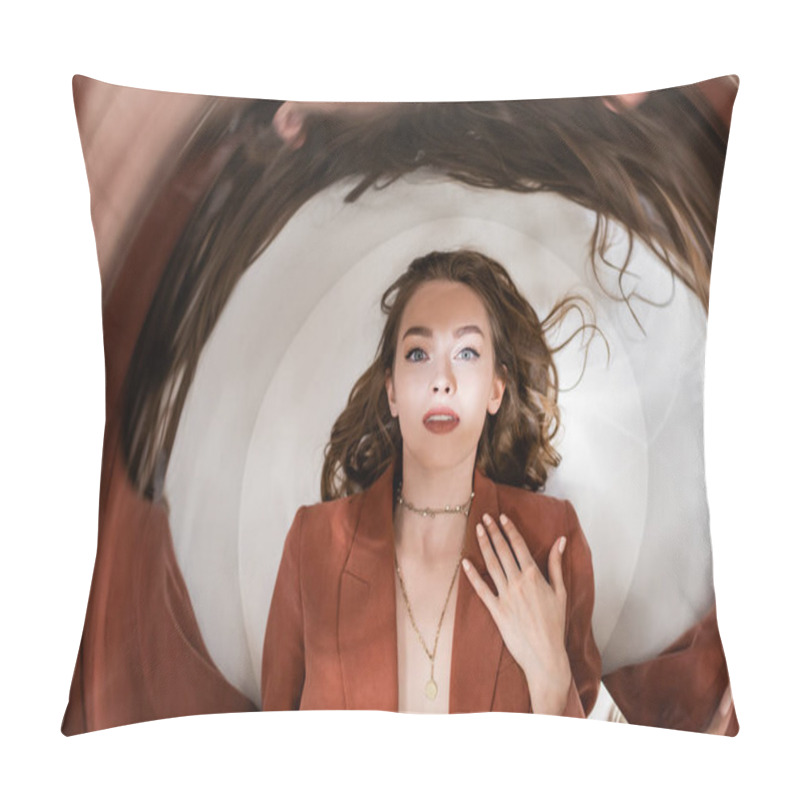 Personality  Circular Shot, Top View Of Alluring Young Woman With Brunette Hair In Blazer Lying And Looking At Camera On Grey Background, Blurred, Distorted View, Abstract Composition, Creative Perspective Pillow Covers