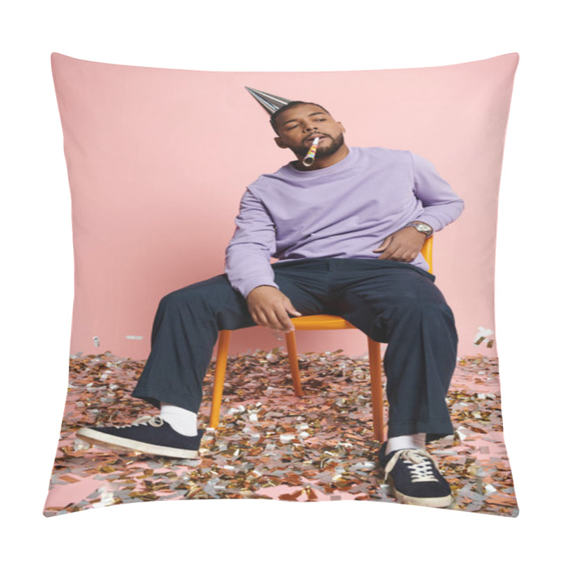 Personality  Young African American Man With Braces Wearing A Party Hat Sitting On A Chair Against A Pink Background. Pillow Covers