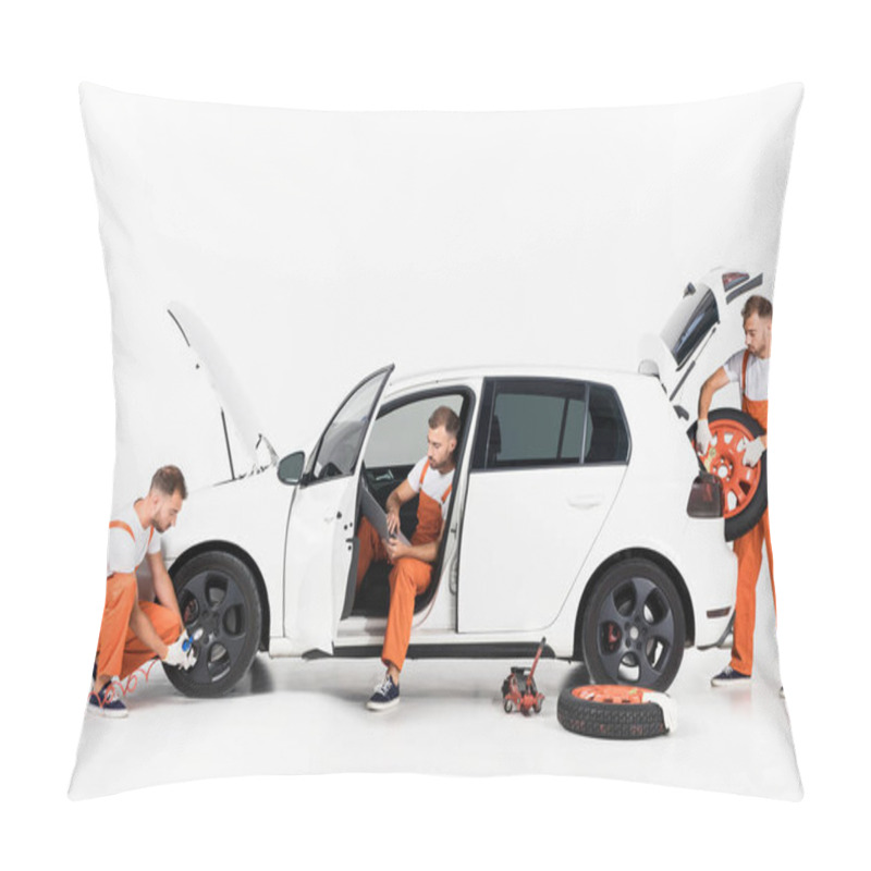 Personality  Handsome Auto Mechanic Inflating Tire, Using Laptop And Taking Tire On White Pillow Covers