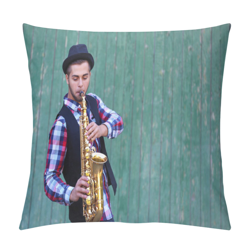 Personality  The Musician Plays Saxophone On Green Wooden Background Pillow Covers