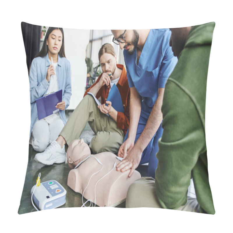 Personality  First Aid Seminar, Medical Instructor Applying Defibrillator Pads On CPR Manikin Near Multiethnic Team With Clipboard And Notebook In Training Room, Health Care And Life-saving Techniques Concept Pillow Covers