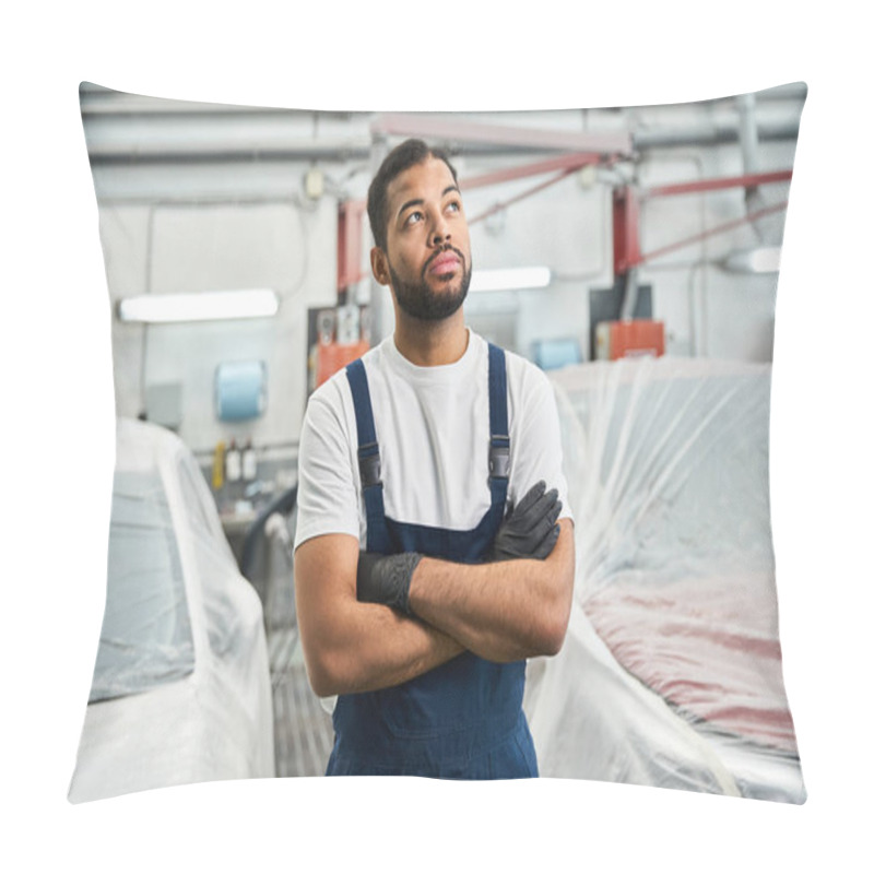 Personality  A Young Mechanic Standing Thoughtfully, Surrounded By Covered Vehicles In A Bustling Workshop. Pillow Covers