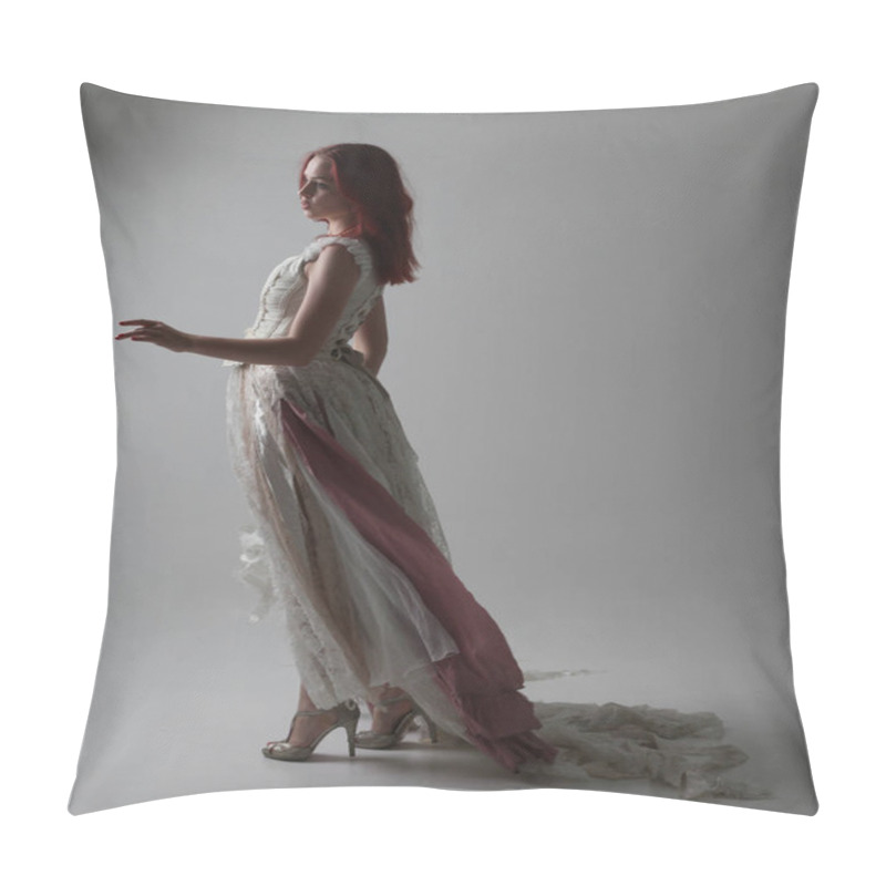 Personality  Full Length Portrait Of Red Haired Girl Wearing Torn And Tattered Wedding Dress. Standing Pose Against A Studio Background With Contrasty Shadow Lighting. Pillow Covers