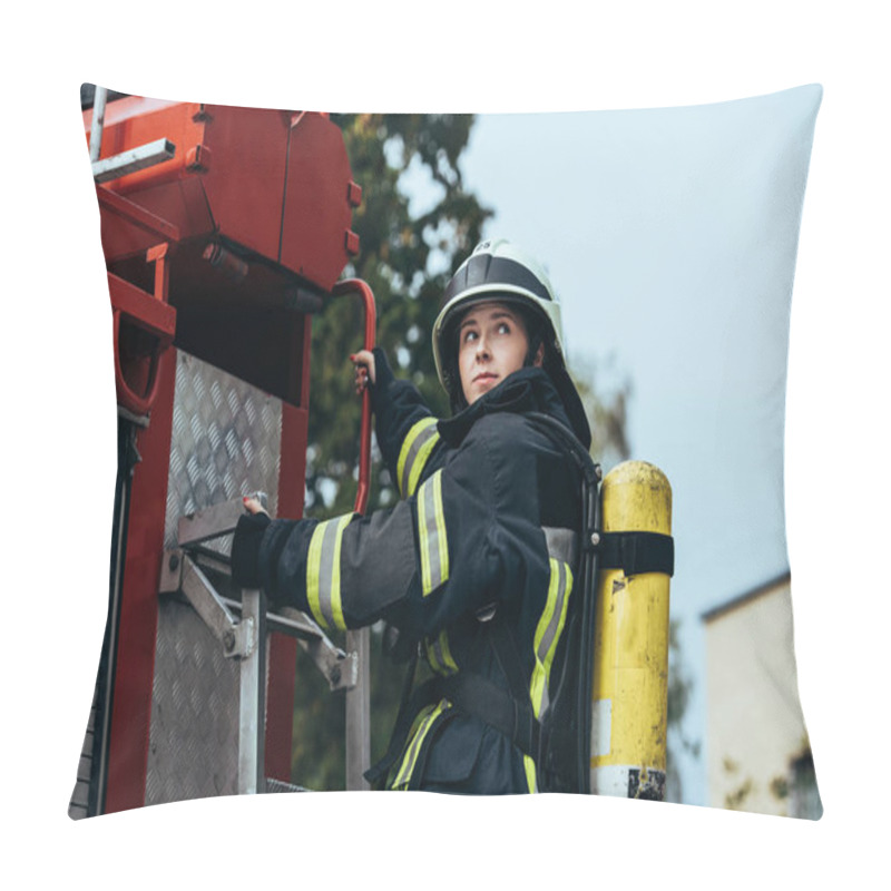 Personality  Female Firefighter With Fire Extinguisher On Back Standing On Fire Truck On Street Pillow Covers