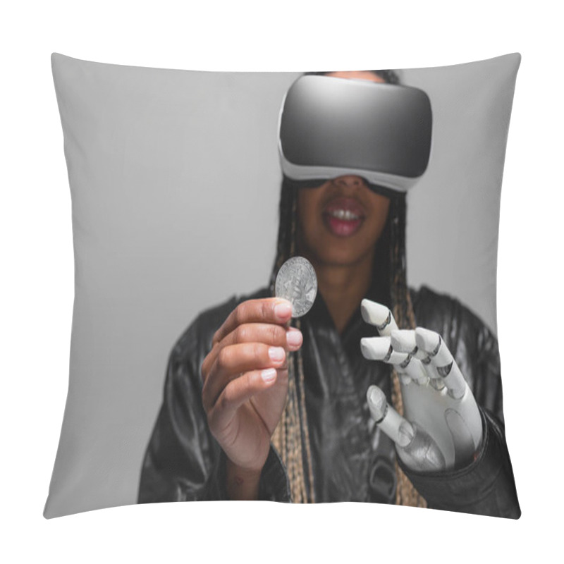 Personality  KYIV, UKRAINE - APRIL 28, 2022: Blurred African American Woman With Vr Headset And Robotic Hand Holding Bitcoin Isolated On Grey  Pillow Covers