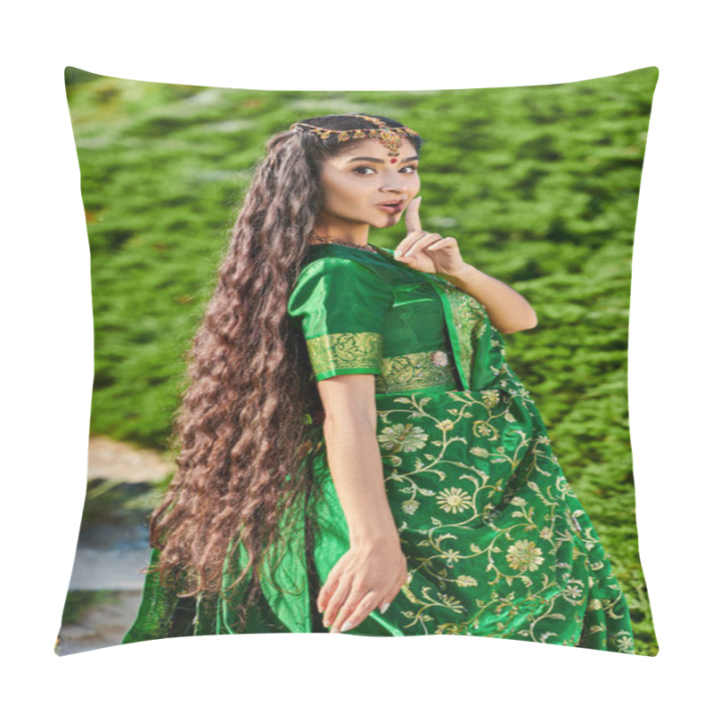 Personality  Young Indian Woman In Sari Showing Secret Gesture And Looking At Camera Near Plants In Park Pillow Covers