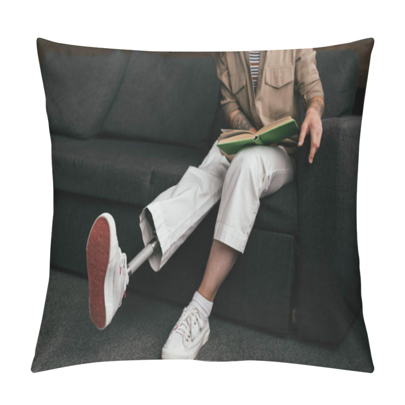 Personality  Cropped View Of Young Woman With Prosthetic Leg Reading Book On Sofa  Pillow Covers