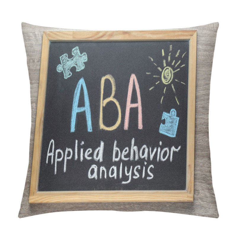 Personality  Small Blackboard With Text ABA Applied Behavior Analysis And Drawings On Wooden Table, Top View Pillow Covers