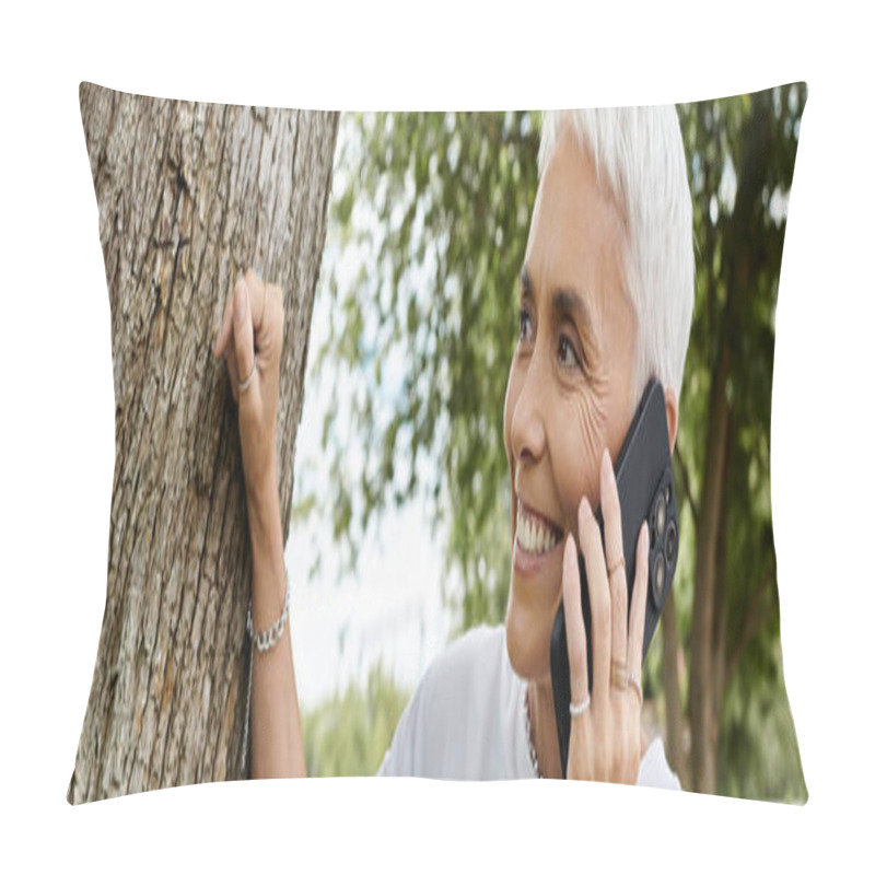 Personality  A Mature Woman Enjoys A Phone Call While Surrounded By Greenery. Pillow Covers