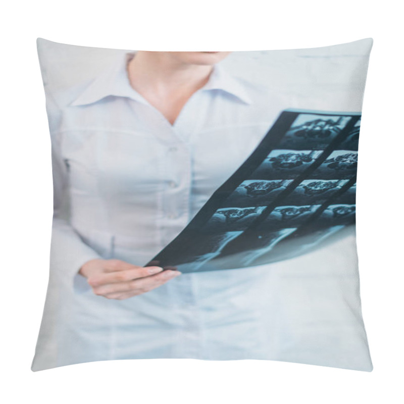 Personality  Cropped Shot Of Female Doctor Examining Mri Scan Pillow Covers