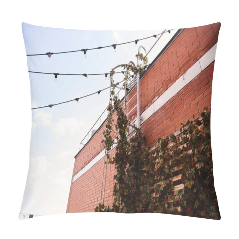 Personality  A Brick Building Adorned With Numerous Vibrant Lights Creating A Dazzling Display Of Illumination Against The Night Sky Pillow Covers