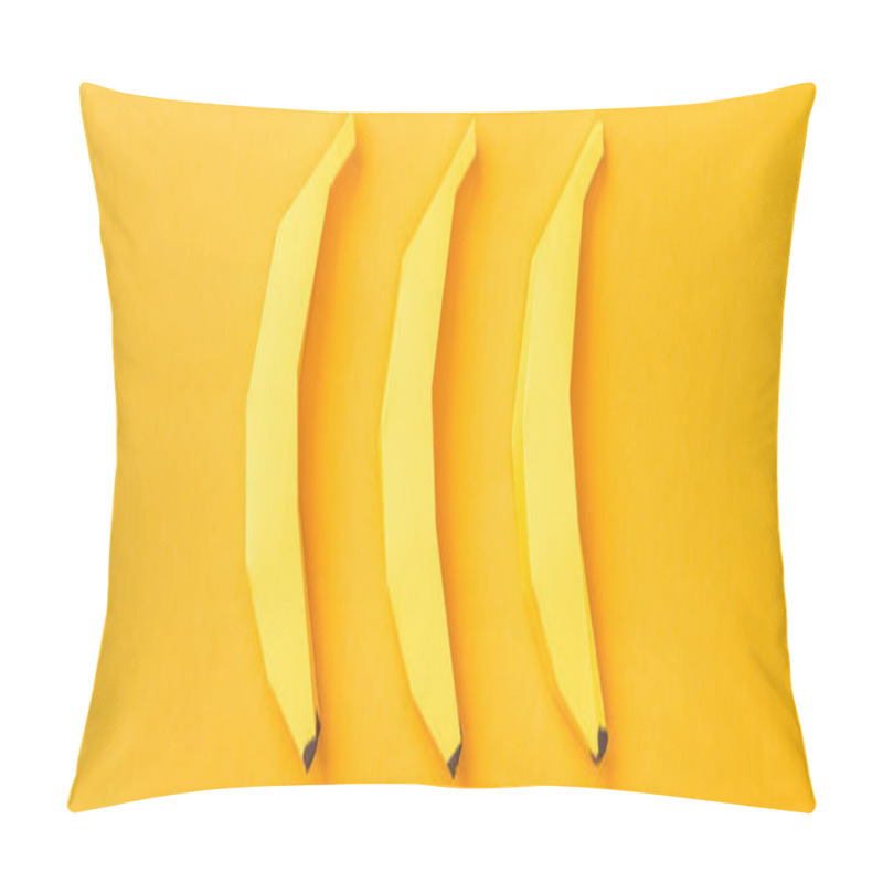 Personality  Panoramic Shot Of Arranged Yellow Paper Bananas On Orange Pillow Covers