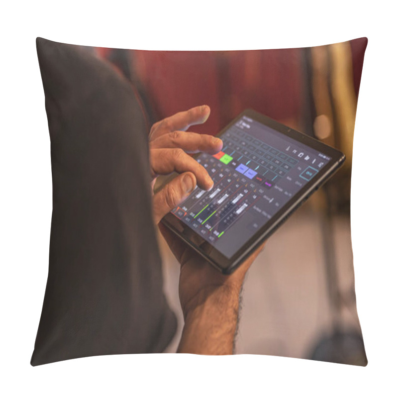 Personality  A Skilled Sound Engineer Uses A Tablet To Fine-tune The Audio Levels During A Dynamic Live Concert Performance. Pillow Covers