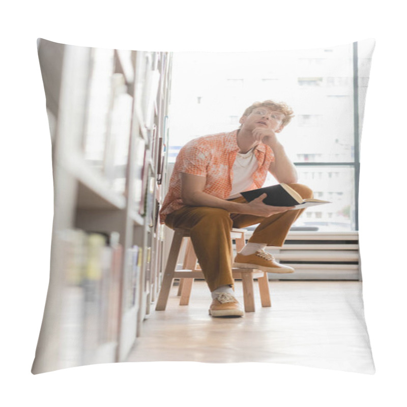 Personality  A Young Man Immersed In Reading While Seated On A Chair. Pillow Covers