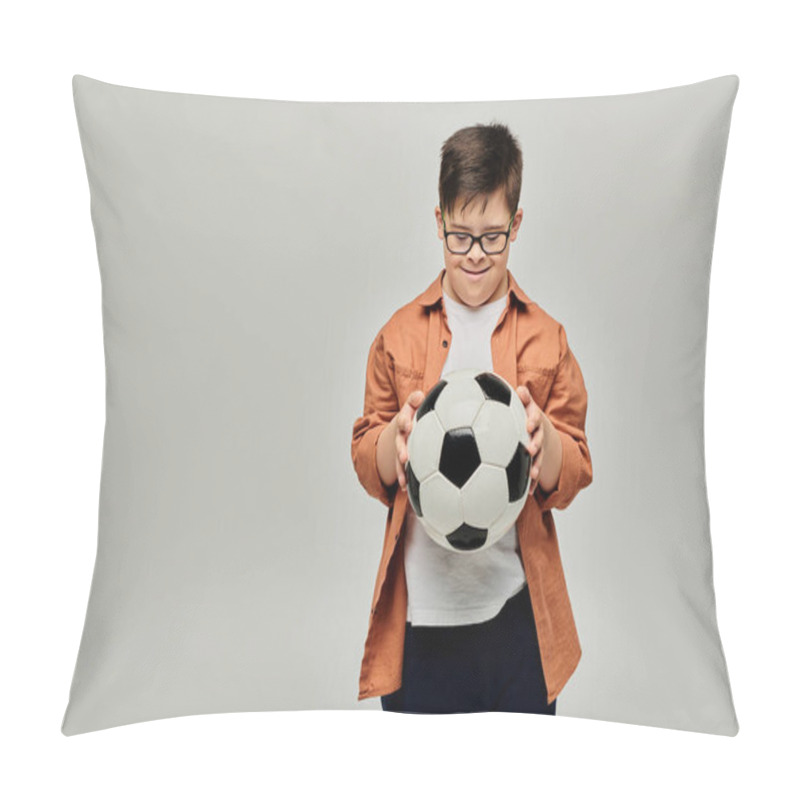 Personality  A Boy With Down Syndrome With Glasses Holds A Soccer Ball Pillow Covers