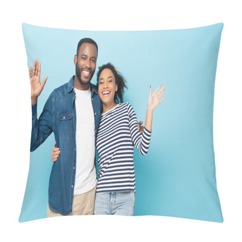 Personality  Joyful African American Couple Waving Hands At Camera Isolated On Blue Pillow Covers