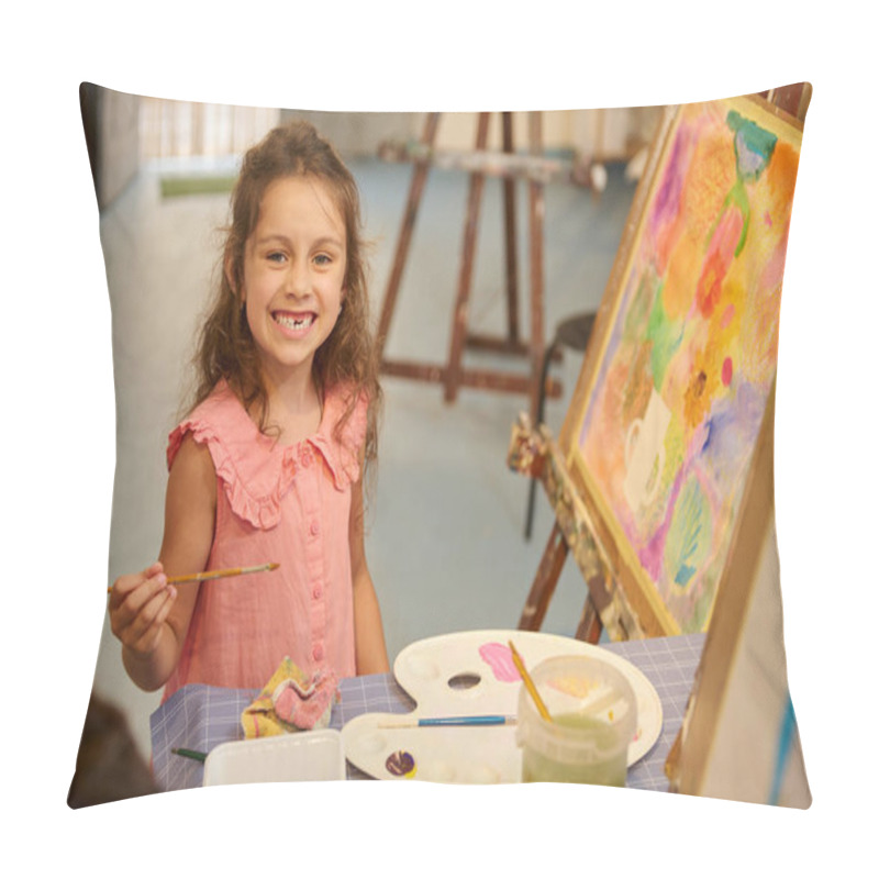 Personality  Caucasian Cute Elementary Age Child, Little Girl Artist Smiles With A Beautiful Toothy Smile, Looking At The Camera, Holding Paintbrush And Drawing On Canvas While Learning Fine Art In Creative Studio Pillow Covers