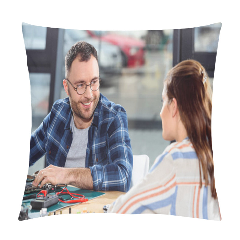 Personality  Smiling Engineer Soldering Hardware And Looking At Female Assistant Pillow Covers