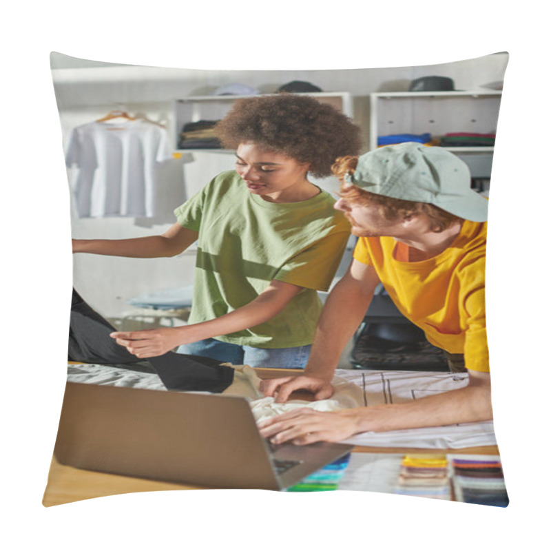 Personality  Young African American Craftswoman Holding Clothes While Working With Colleague Near Blurred Laptop And Color Swatches On Wooden Table In Print Studio, Small Business Success Concept Pillow Covers