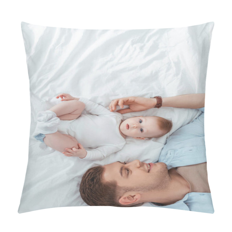 Personality  Top View Of Happy Young Man Touching Adorable Baby Boy While Lying Near Him In Bed Pillow Covers