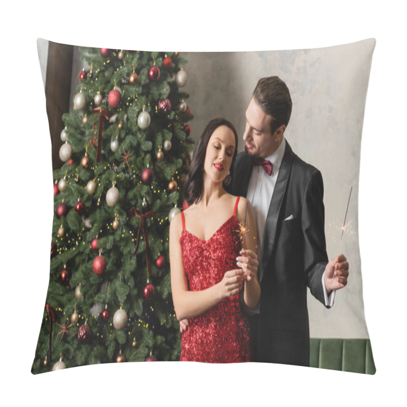 Personality  Cheerful Wealthy Couple In Formal Attire Smiling And Holding Sparklers Near Christmas Tree Pillow Covers