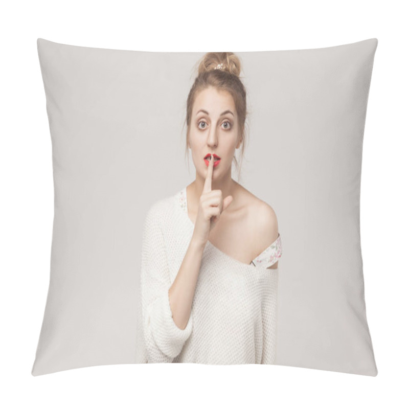 Personality  Secrecy Sign. Blone Woman With Big Eyes, Showing Secret Shh Sign. Studio Shot, Isolated On Gray Background Pillow Covers