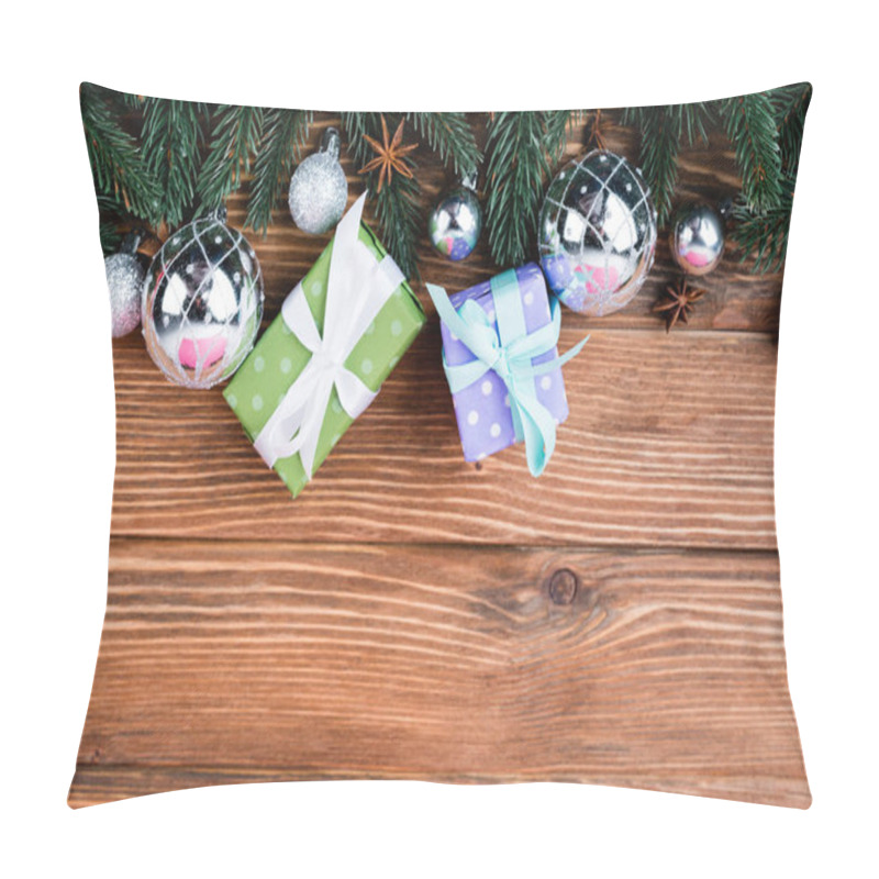 Personality  Top View Of Little Gift Boxes, Baubles, Anise Stars And Pine Branches On Brown Wooden Background Pillow Covers