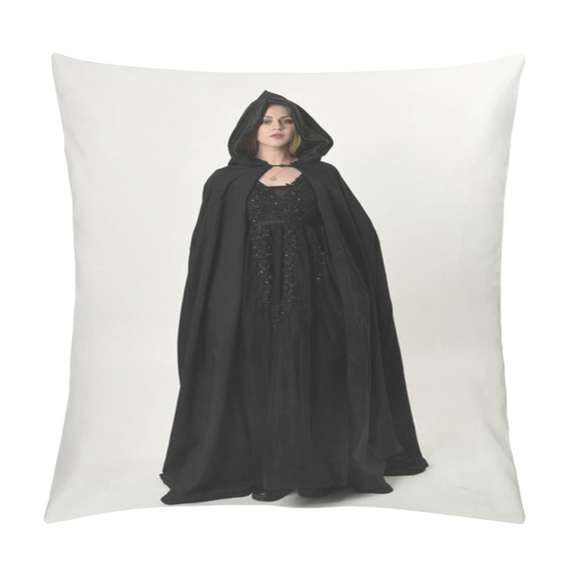 Personality  Full Length Portrait Of Blonde Girl Wearing Long Black Flowing Cloak, Standing Pose  With  A White Studio Background. Pillow Covers