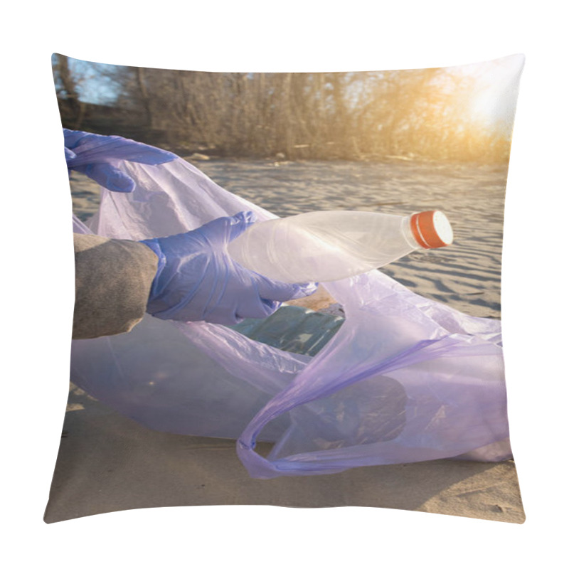 Personality  A Beach Cleanup Effort During Sunset With A Person Holding A Transparent Trash Bag. The Soft Lighting And Environmental Message Make This Image Perfect For Sustainability Campaigns Pillow Covers