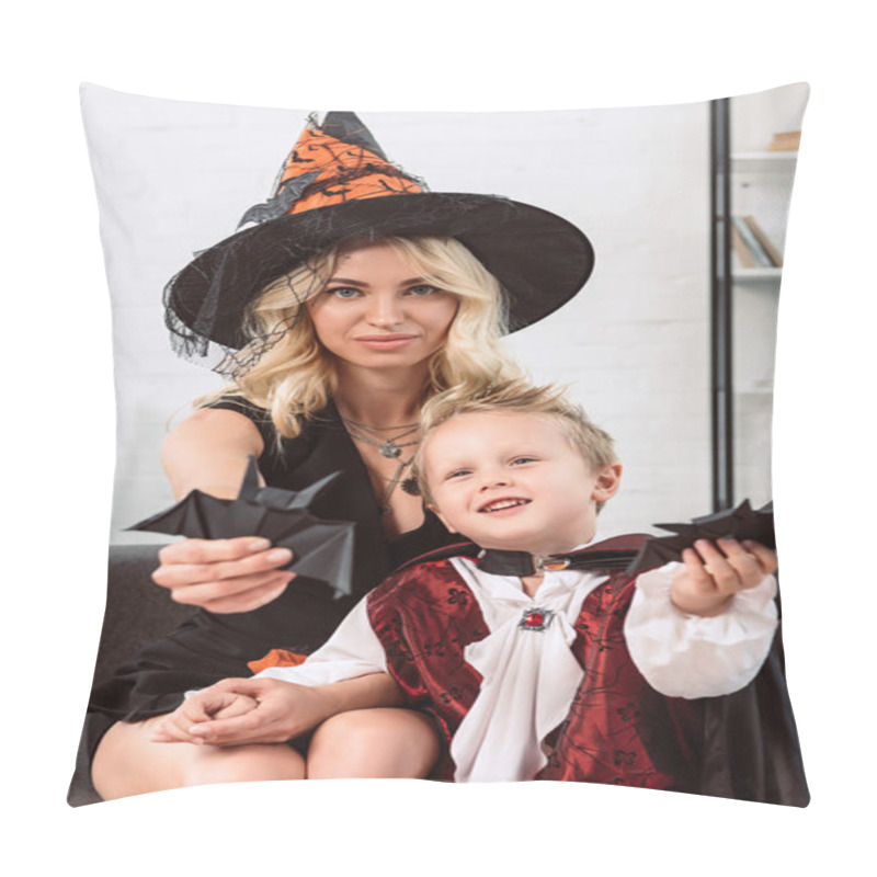 Personality  Mother And Little Son In Halloween Costumes Showing Black Paper Bats On Sofa At Home Pillow Covers