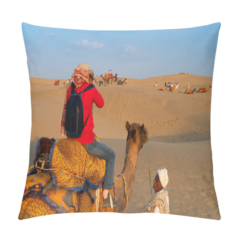 Personality  Thar Desert,Rajasthan,India-15th October 2019 : Cameleer Looking Up To Female Tourist Photographing The Desrt, Camels, Camelus Dromedarius, Into Sand Dunes. Camel Riding Is Popular For Travellers. Pillow Covers