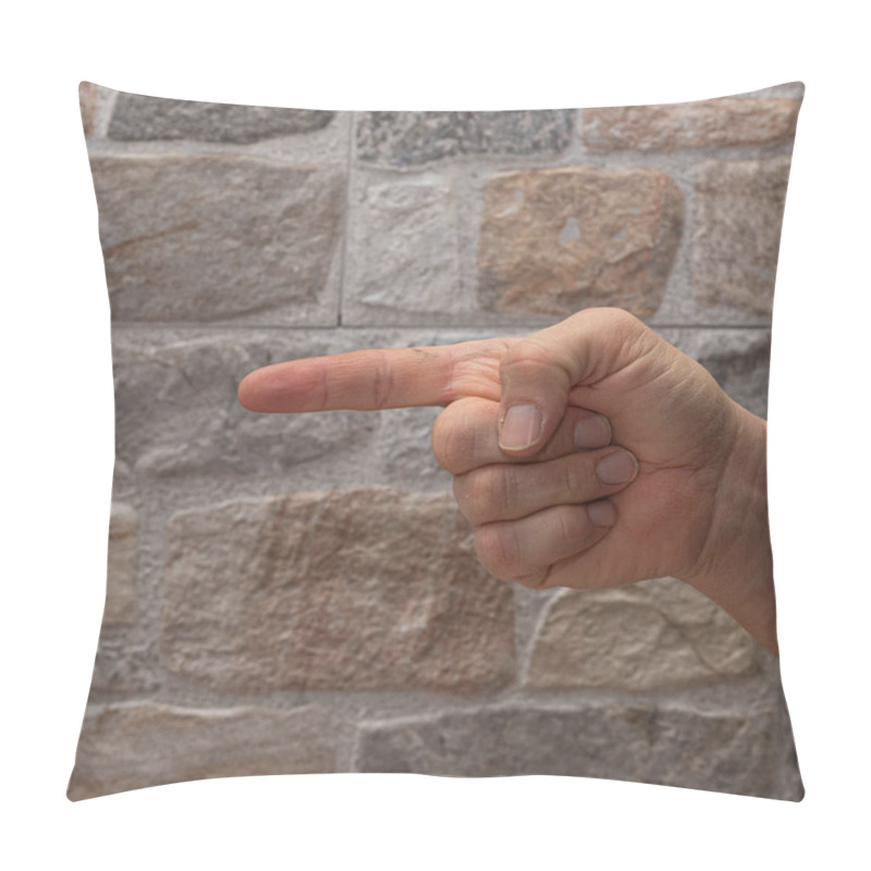 Personality  Hand Pointing Directly With One Finger Against A Textured Stone Wall Background Pillow Covers