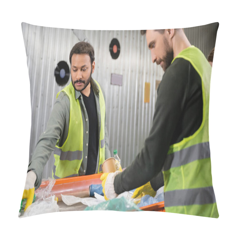 Personality  Indian Sorter In Gloves And Protective Vest Taking Trash From Conveyor Near Blurred Colleague Working Together In Garbage Sorting Center, Garbage Sorting And Recycling Concept Pillow Covers