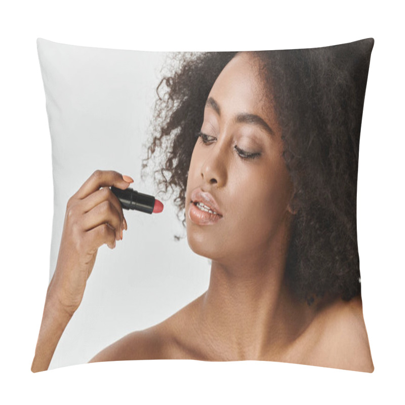 Personality  A Young African American Woman With Curly Hair Is Skillfully Applying Lipstick To Her Face In A Studio Setting. Pillow Covers