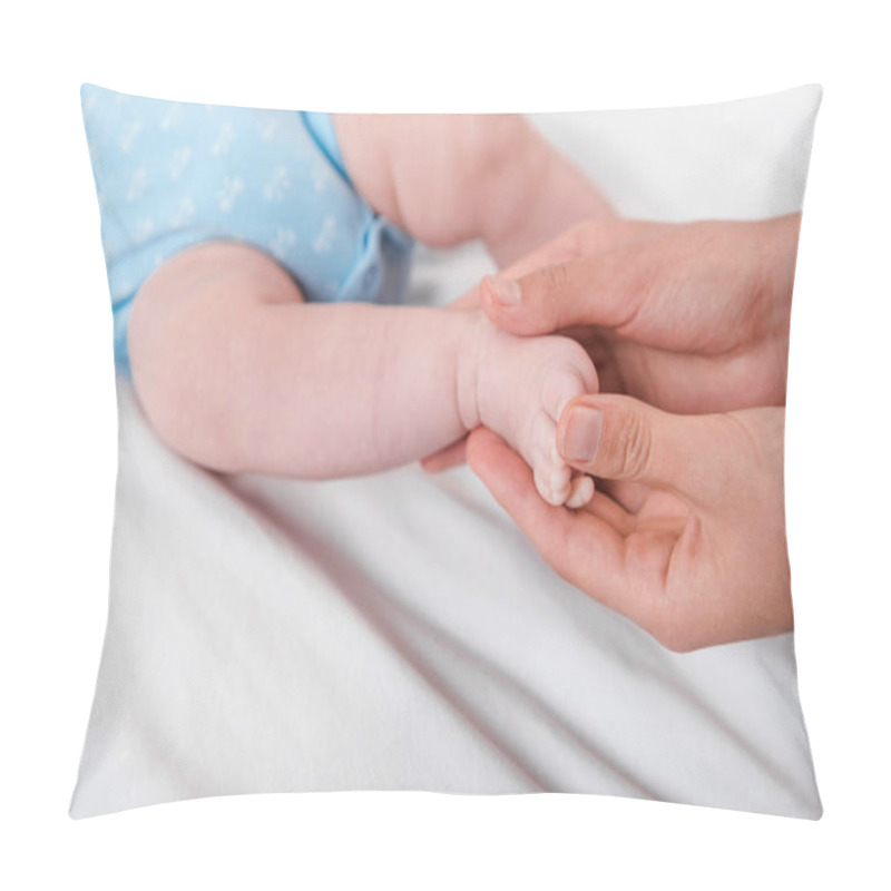 Personality  Cropped View Of Woman Touching Legs Of Infant While Doing Massage  Pillow Covers