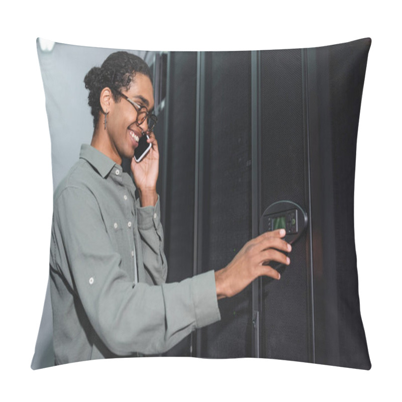 Personality  Cheerful African American Engineer Talking On Smartphone While Pushing Control Panel On Server Pillow Covers