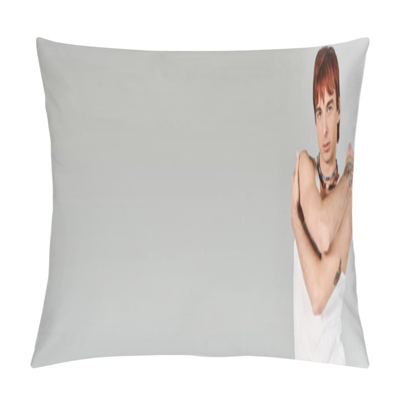 Personality  A Stylish Young Man With Red Hair Striking A Pose In A Studio Setting Against A Grey Background. Pillow Covers