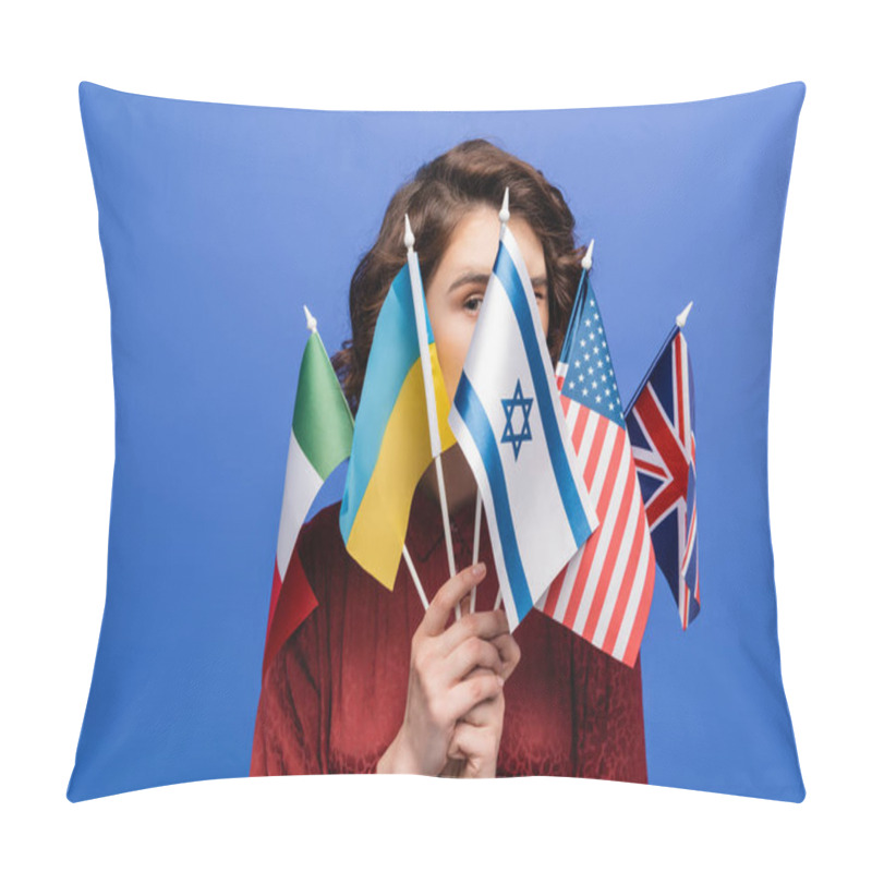 Personality  Young Woman Looking At Camera Behind Various International Flags Isolated On Blue Pillow Covers