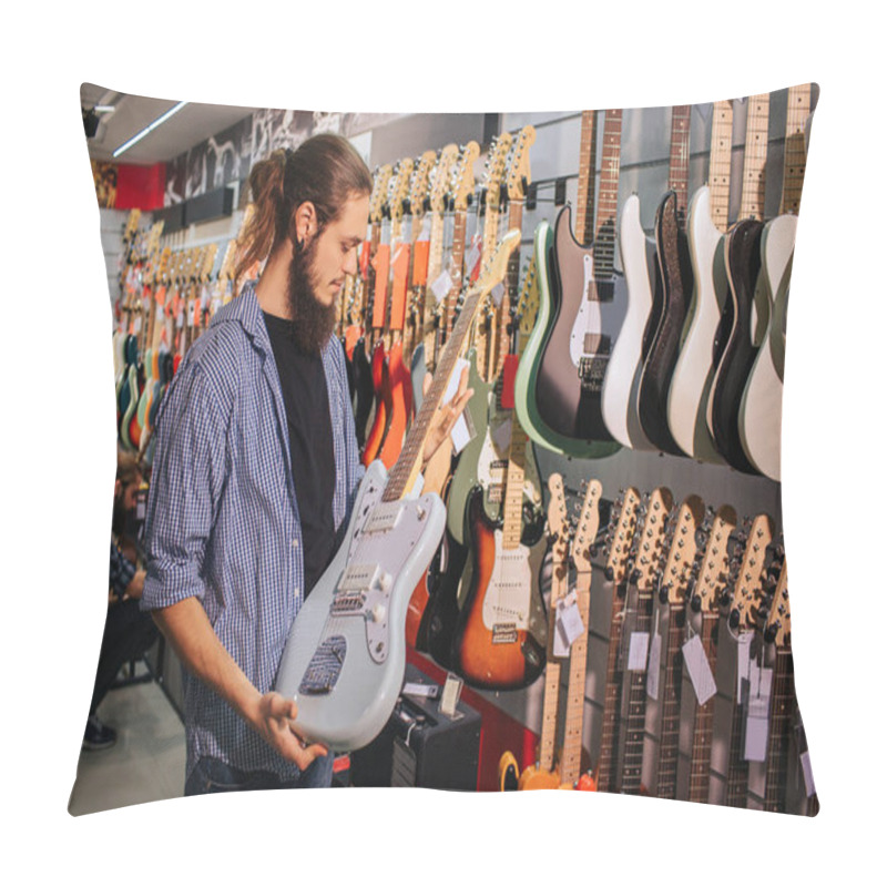 Personality  Young Bearded Musician Hold Light-blue Electric Guitar In Hands. He Looks At It. Pillow Covers