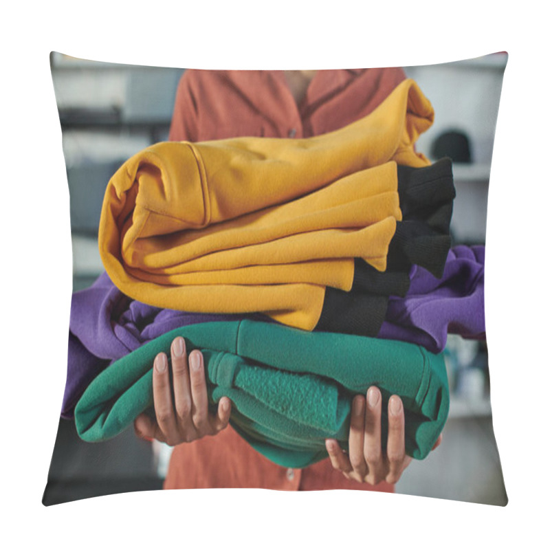 Personality  Cropped View Of Blurred Young African American Artisan Holding Clothes While Standing And Working In Print Studio, Customer-focused Entrepreneur Concept  Pillow Covers