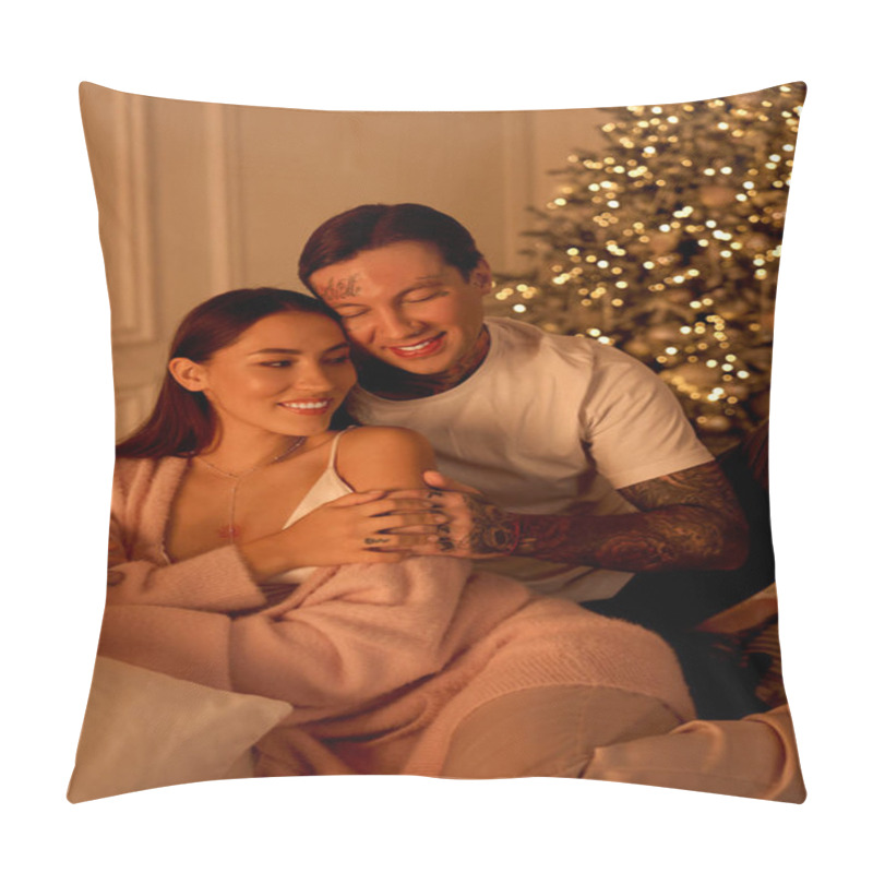 Personality  A Young Couple Cuddles And Smiles Together By A Decorated Christmas Tree. Pillow Covers