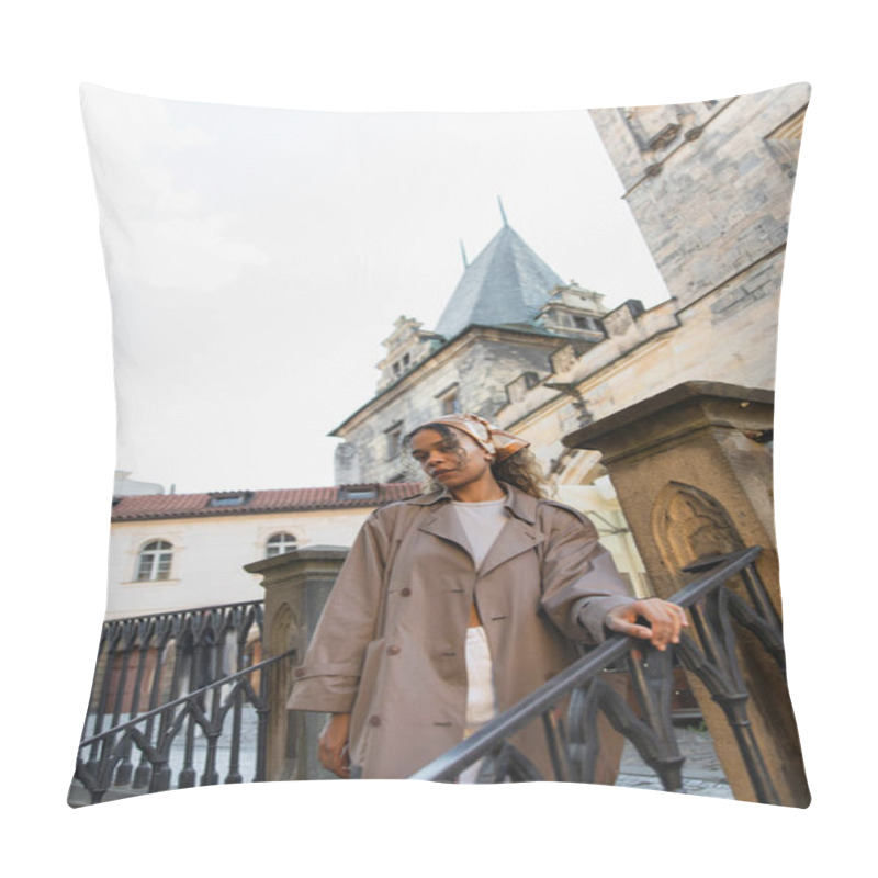 Personality  Low Angle View Of Stylish African American Woman In Trench Coat Near Old Town Hall Tower In Prague Pillow Covers