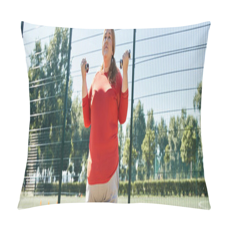 Personality  A Joyful Woman Lifts Weights While Exercising Outdoors In Bright Sunlight. Pillow Covers