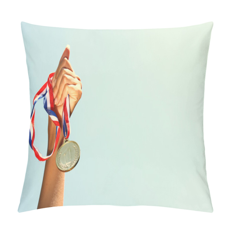 Personality  Woman Hand Raised, Holding Gold Medal Against Sky. Award And Victory Concept. Pillow Covers