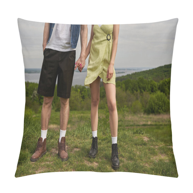 Personality  Cropped View Of Stylish Romantic Couple In Summer Outfits And Boots Holding Hands And Standing On Grassy Hill With Blurred Landscape At Background, Countryside Wanderlust And Love Concept Pillow Covers