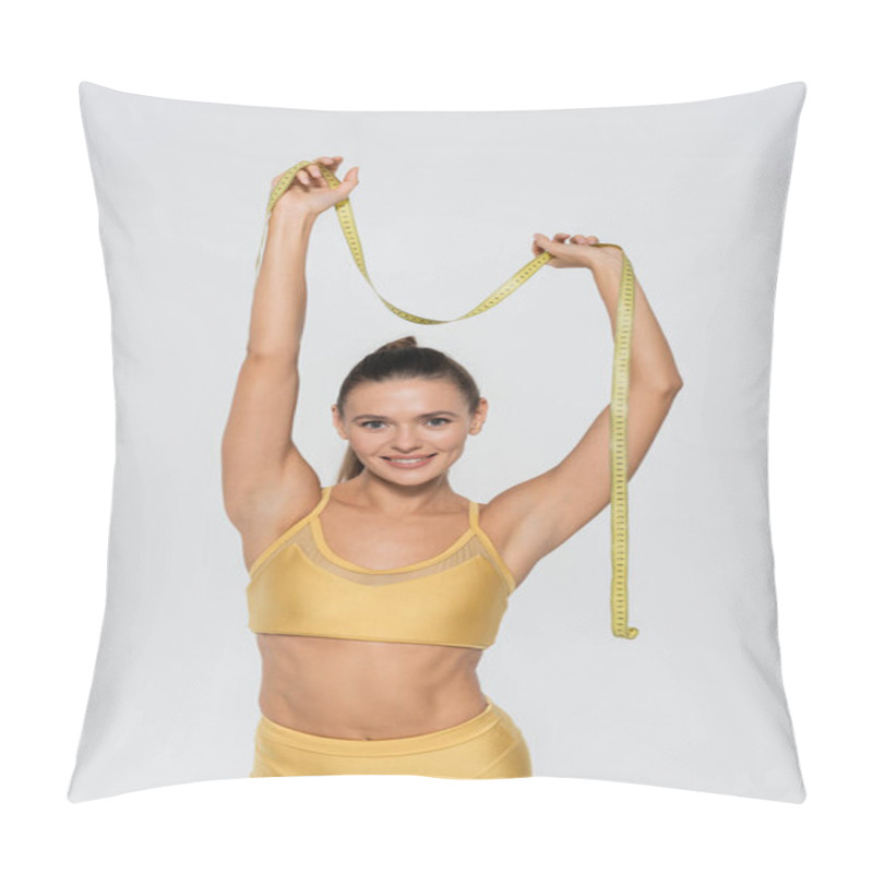 Personality  Weight Loss, Happy Sportswoman With Toned Body Holding Measuring Tape Above Head On White Background Pillow Covers