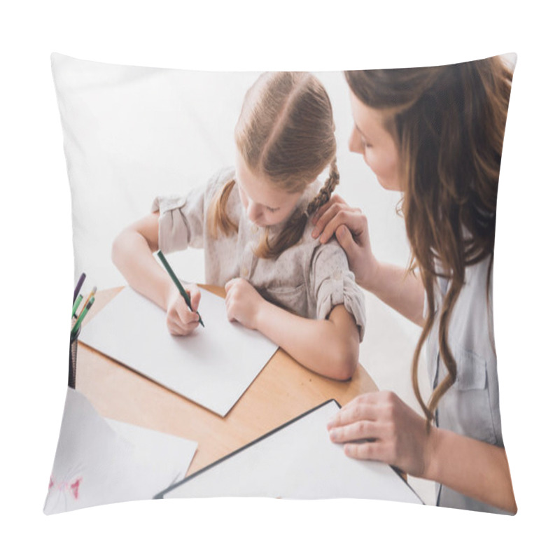 Personality  High Angle View Of Psychologist With Clipboard Sitting Near Little Child While She Drawing With Color Pencils Pillow Covers