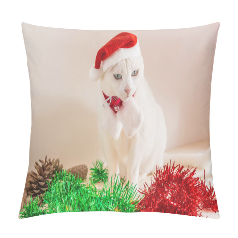 Personality  A Closeup Shot Of White Cat With Christmas Santa Claus Hat With Ornaments On A Table Pillow Covers